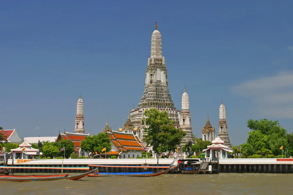 Wat Arun beside the Chao Phraya River in Bangkok