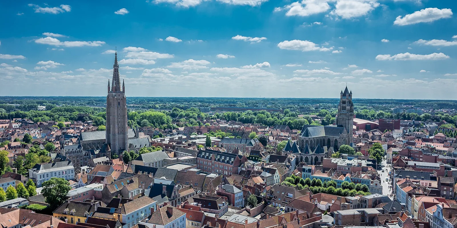 Rooftops of Bruges, with the spires of the Church of Our Lady and Saint Salvator’s Cathedral, seen from the Belfry