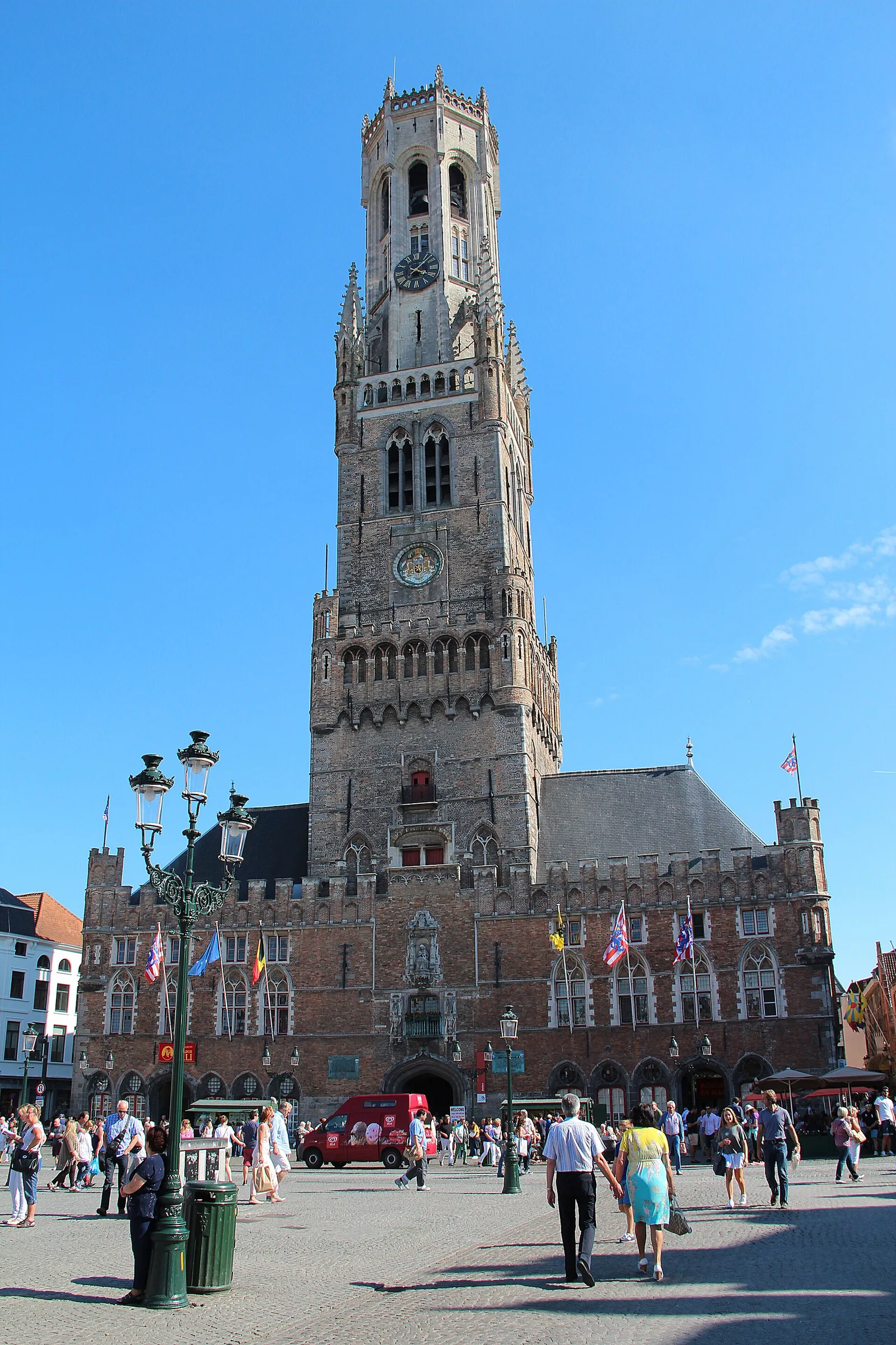 The Belfry tower rising above the market halls on the Markt in Bruges