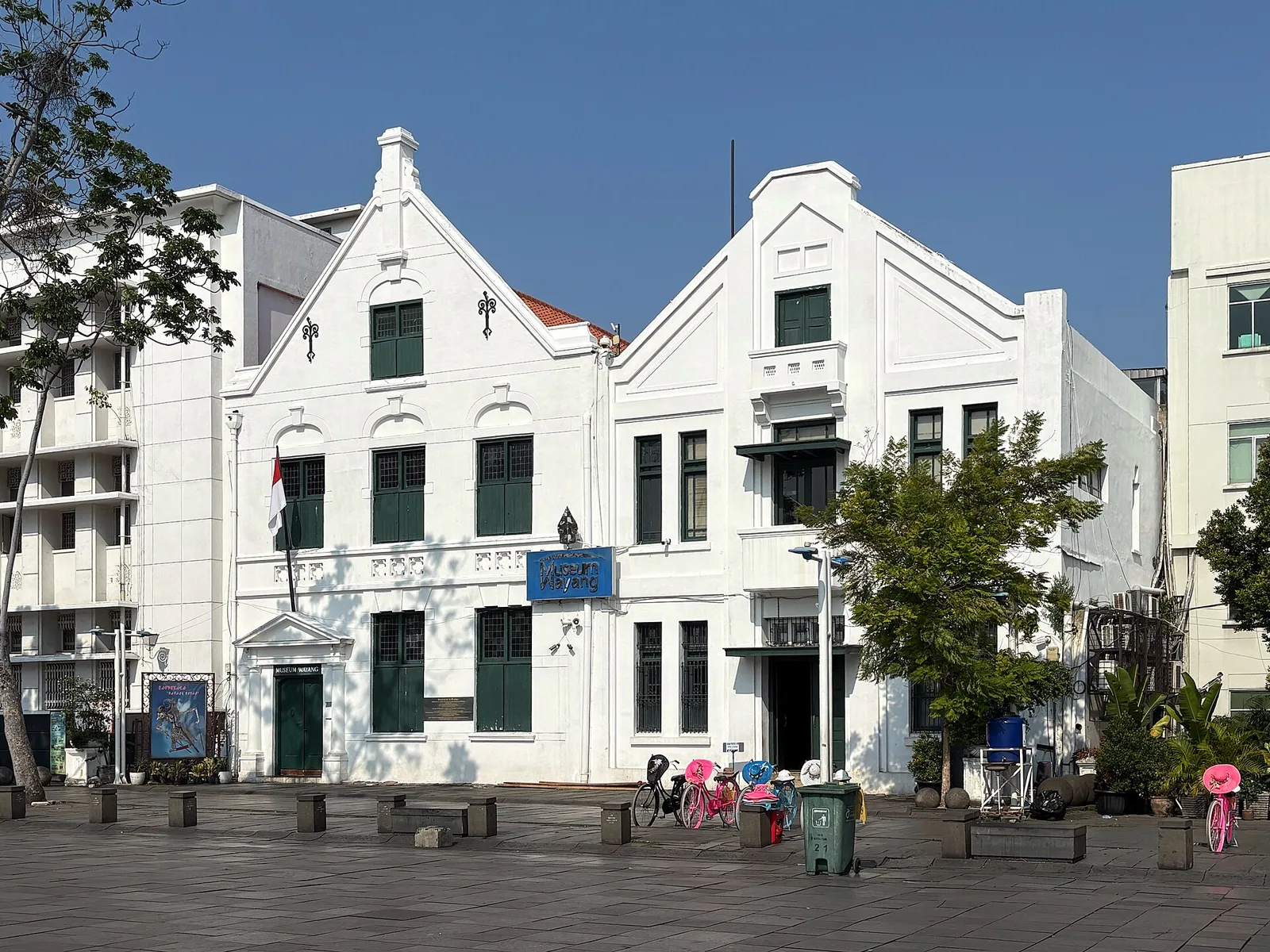 The white colonial-era facade of the Wayang Museum on Fatahillah Square