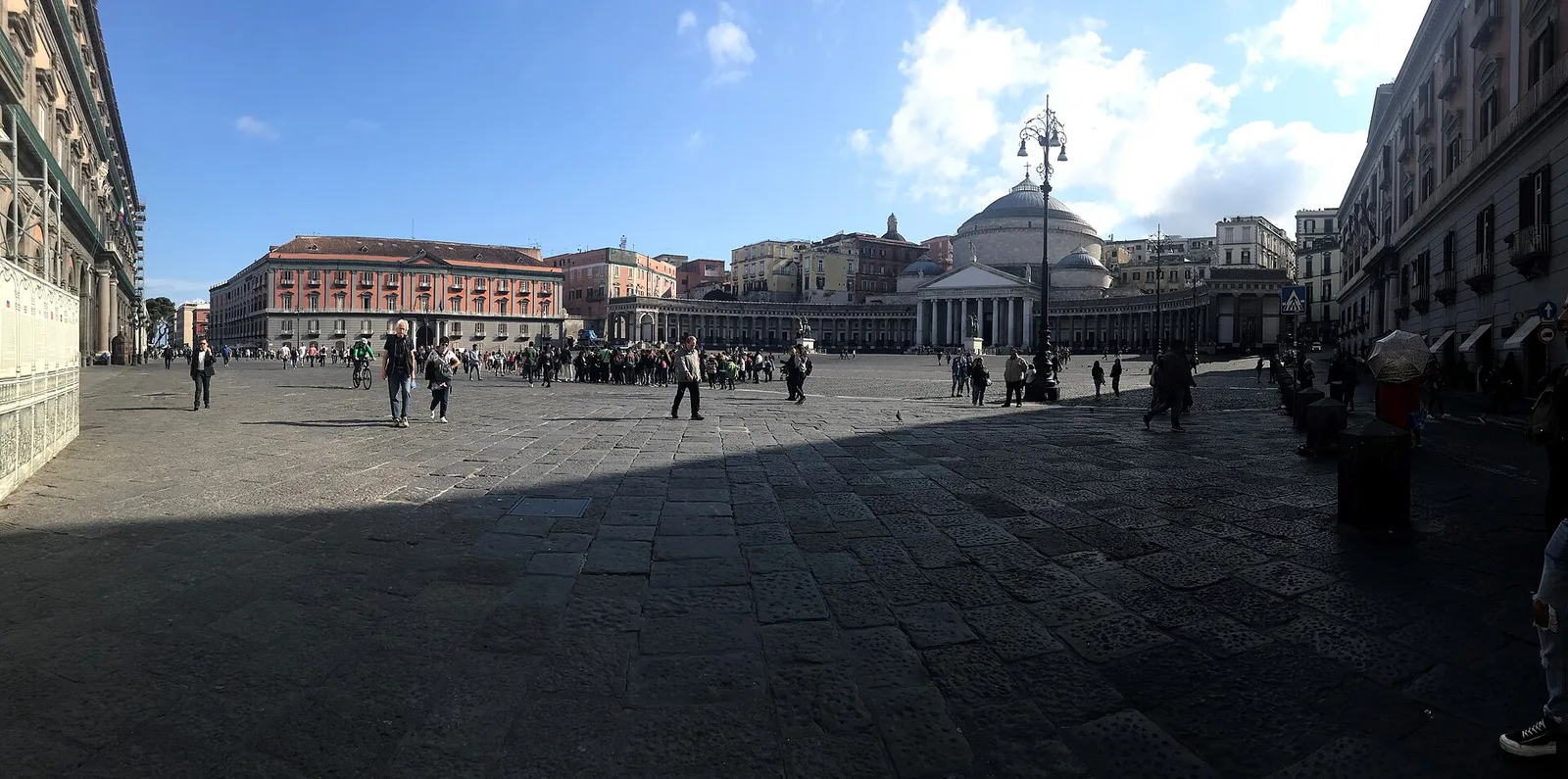 The wide Piazza del Plebiscito, with the colonnade and dome of the church of San Francesco di Paola behind