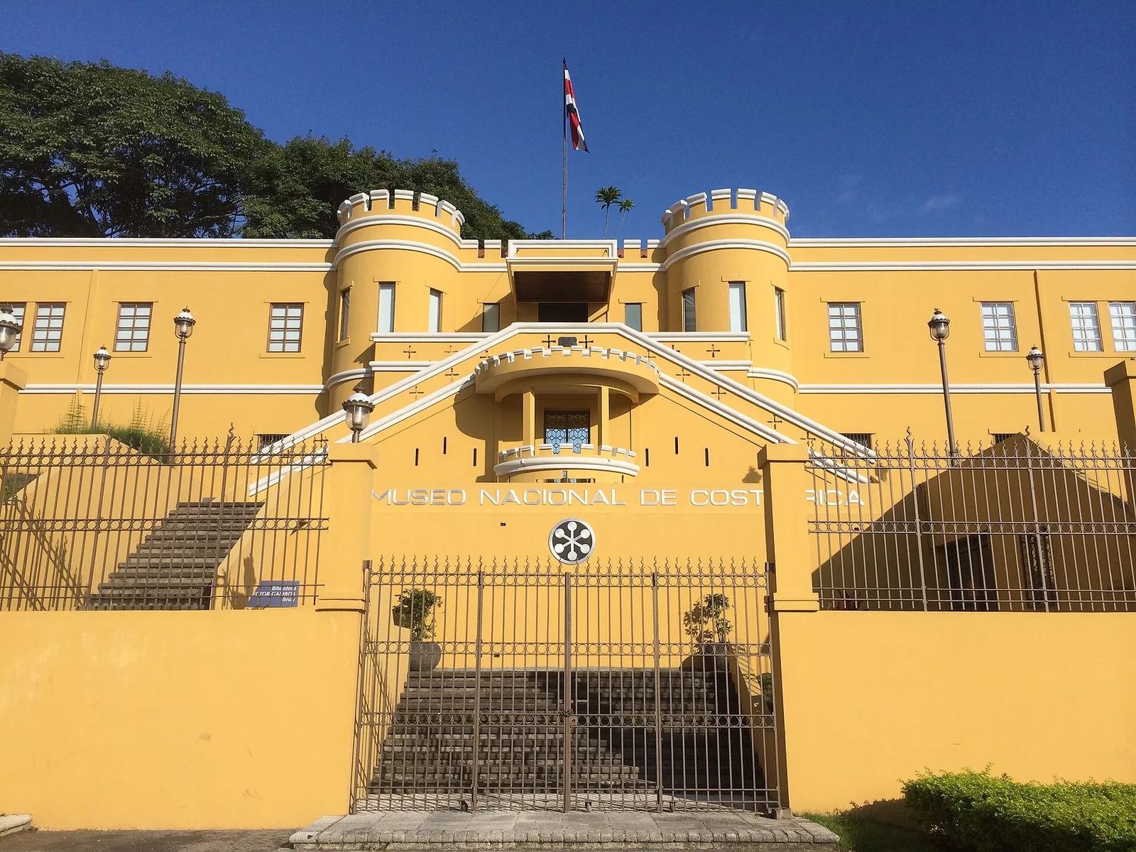 The yellow, turreted walls of the former Bellavista Fortress, now the National Museum of Costa Rica