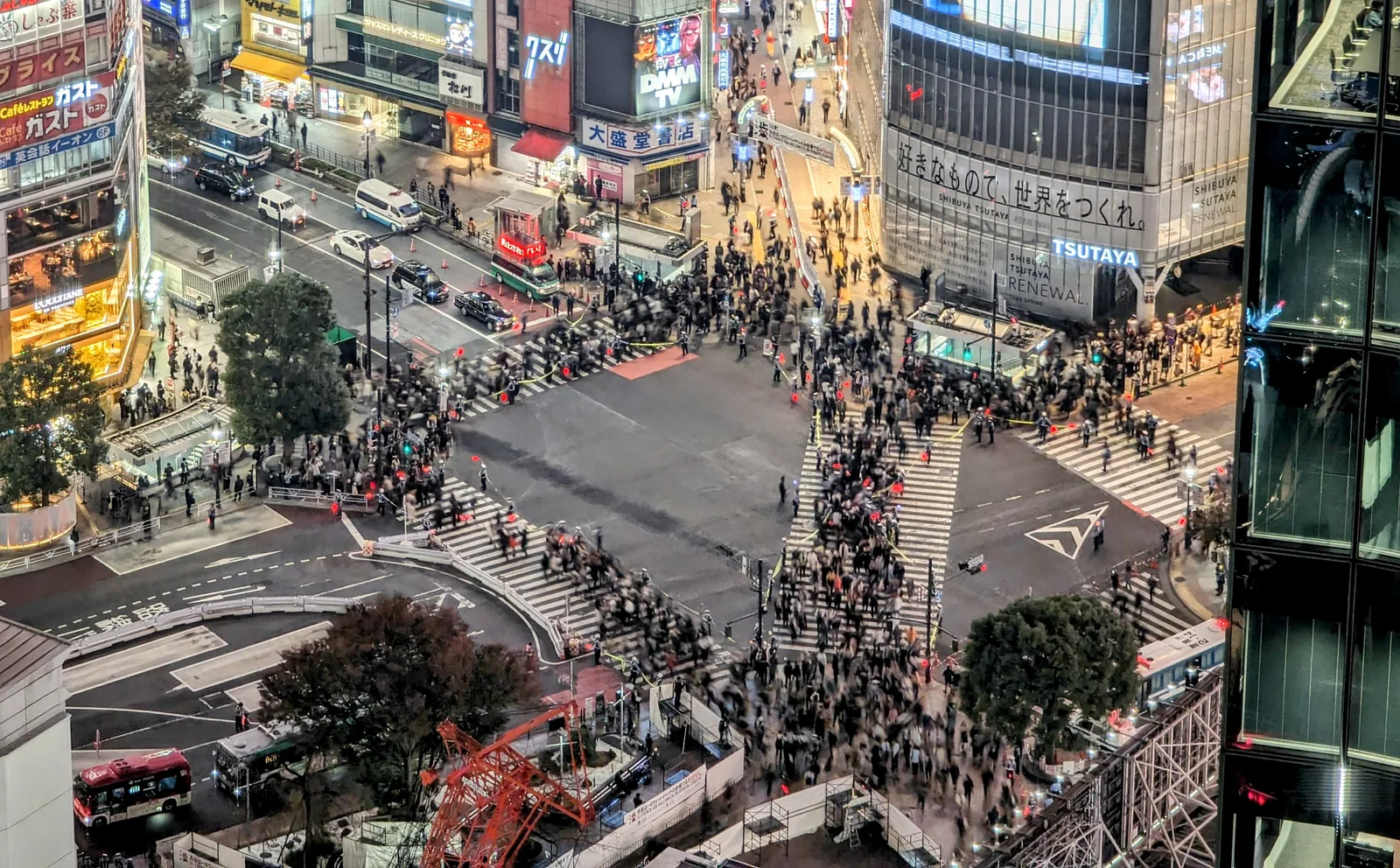 Pedestrians crossing Shibuya Crossing in Tokyo